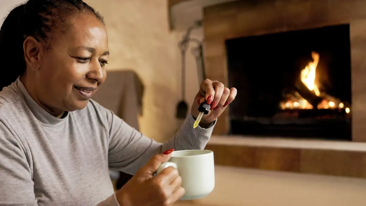 Woman drinking coffee and cbd